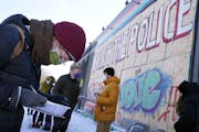 “It’s so cold,” Karly Bergmann of Minneapolis said Saturday as she signed a petition to change the Minneapolis City Charter to establish a new D