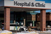 A security vehicle barred the entrance to the Allina Health clinic in Buffalo, Minn., where five people were shot Tuesday, killing one. 