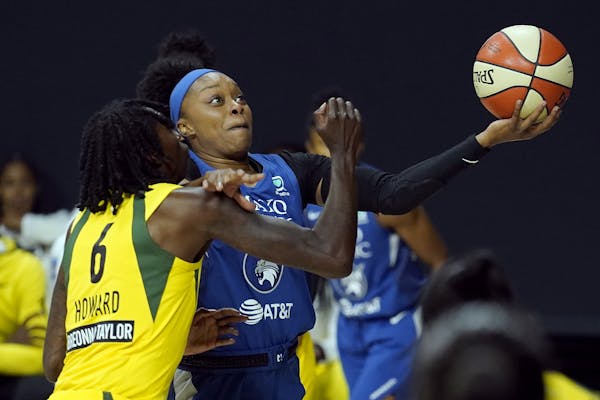 Odyssey Sims shot over Seattle’s Natasha Howard during a game on Sept. 27 in Bradenton, Fla.