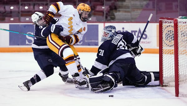 Ben Meyers (39) and the Gophers opened the season with a sweep against Penn State at 3M Arena at Mariucci.