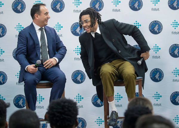Timberwolves President of Operations, Gersson Rosas, left, and D’Angelo Russell at news conference last February after Russell was traded to Minneso