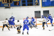 Minnetonka boys' hockey scores just before time expires, skates to tie with Wayzata