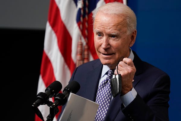 Biden marks 50 million COVID shots since taking office