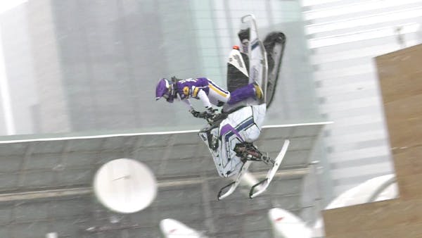 Levi LaVallee lands backflip snowmobile stunt over Nicollet Mall in Minneapolis