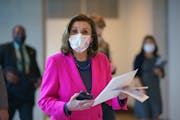 Speaker of the House Nancy Pelosi, D-Calif., walks to a news conference as the Democratic-led House is poised to pass a bill that enshrines protection