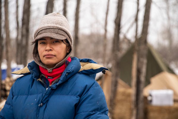 Alex Golden-Wolf, who is Ojibwe, quit her restaurant jobs in the Duluth area to move to Camp Migizi, near Cloquet, to protest Line 3.
