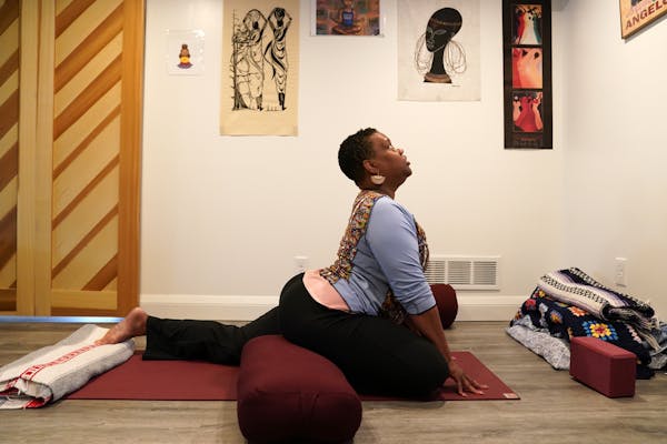 Yoga instructor Marjorie Grevious, who has been teaching from home due to COVID, demonstrated restorative yoga poses after teaching a virtual class fr