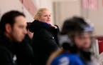 Minnetonka coach Tracy Cassano, behind the bench during a game in December 2019.