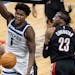 Timberwolves rookie Anthony Edwards reacts after dunking over Portland’s Robert Covington in the fourth quarter Sunday