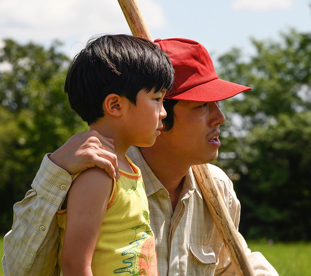 Steven Yeun (right) appears in 'Minari. with Alan Kim by Lee Isaac Chung.