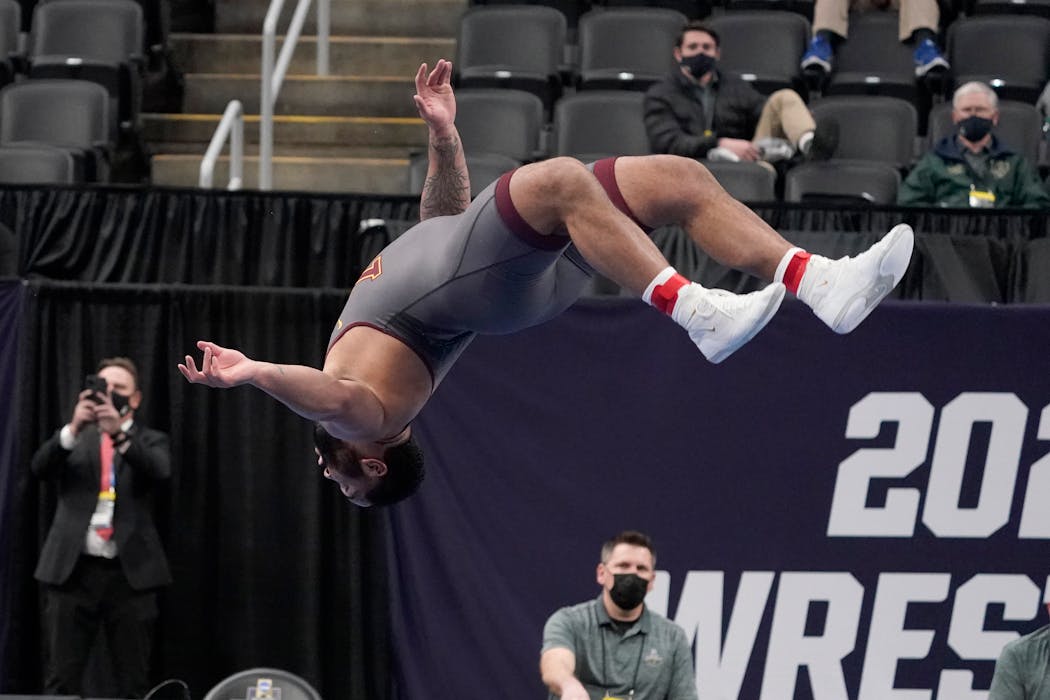 Gable Steveson does a backflip to celebrate after defeating Michigan's Mason Parris
