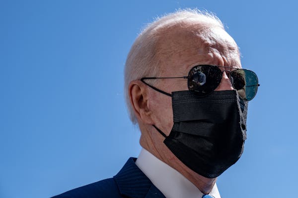 President Joe Biden meets with reporters before boarding Marine One at the White House in Washington on Friday, March 26, 2021, for a scheduled weeken