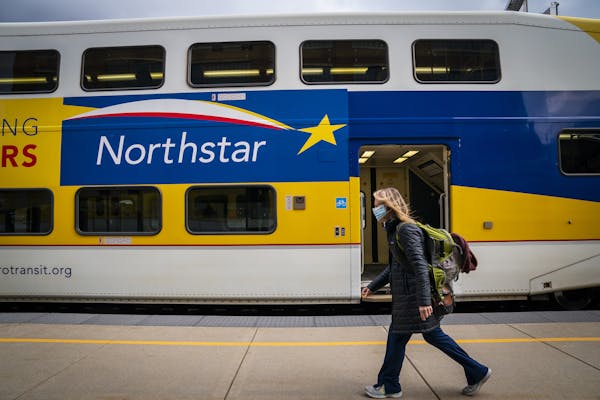 Commuters boarded the Northstar commuter train at Target Field station in Minneapolis. LEILA NAVIDI • leila.navidi@startribune.com