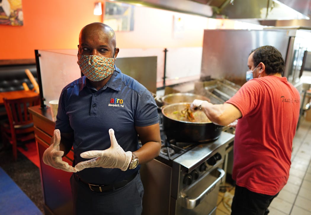 Abdirahman Kahin closed his Afro Deli location in Baker Center and put his team at his larger St. Paul restaurant, cooking for charities.
