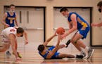 Wayzata Trojans guard Trey Lance (11) tossed a loose ball her recovered to teammate Carter Bjerke (32) in the second half. ] JEFF WHEELER • jeff.whe