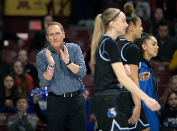 Hopkins’ Head Coach Brian Cosgriff on the court as the team took on Cambridge-Isanti in the Class 4A girls' basketball quarterfinals at Williams Are