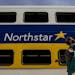 A passenger walked to board the Northstar Commuter Rail train out of Minneapolis in August.