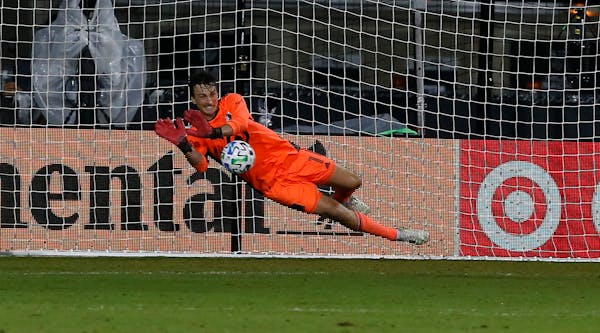 Minnesota United goalkeeper Tyler Miller makes the game-winning save on a penalty kick against the Columbus Crew last July