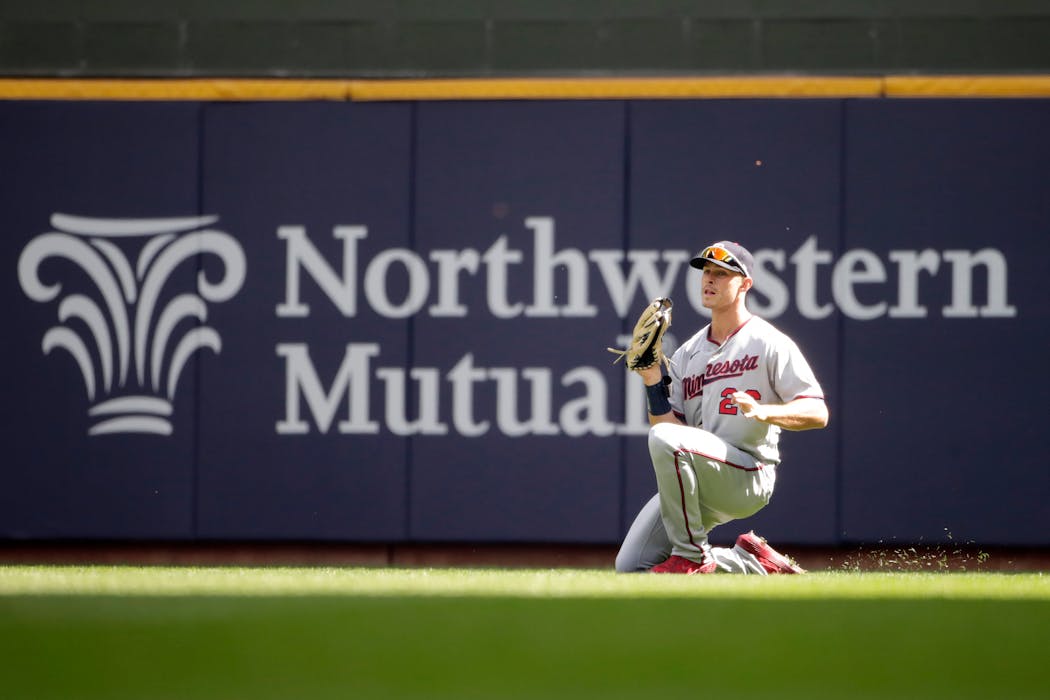 Twins outfielder Max Kepler went to a knee to make a catch during the third inning against the Brewers on Sunday.