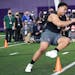 Northwestern offensive lineman Rashawn Slater participates in the school’s Pro Day football workout for NFL scouts on March 9.