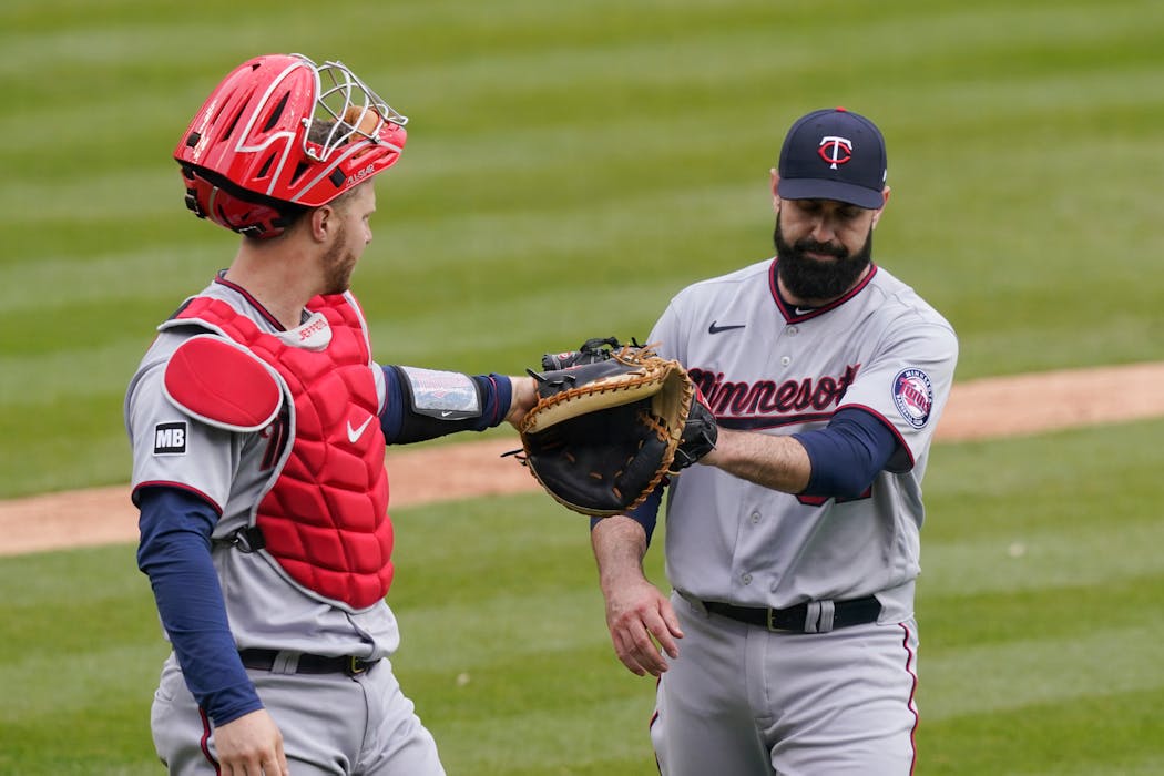Twins righthander Matt Shoemaker was congratulated by catcher Ryan Jeffers. Shoemaker allowed one run over six innings in his team debut as the Twins hammered the Tigers 15-6 on Monday.