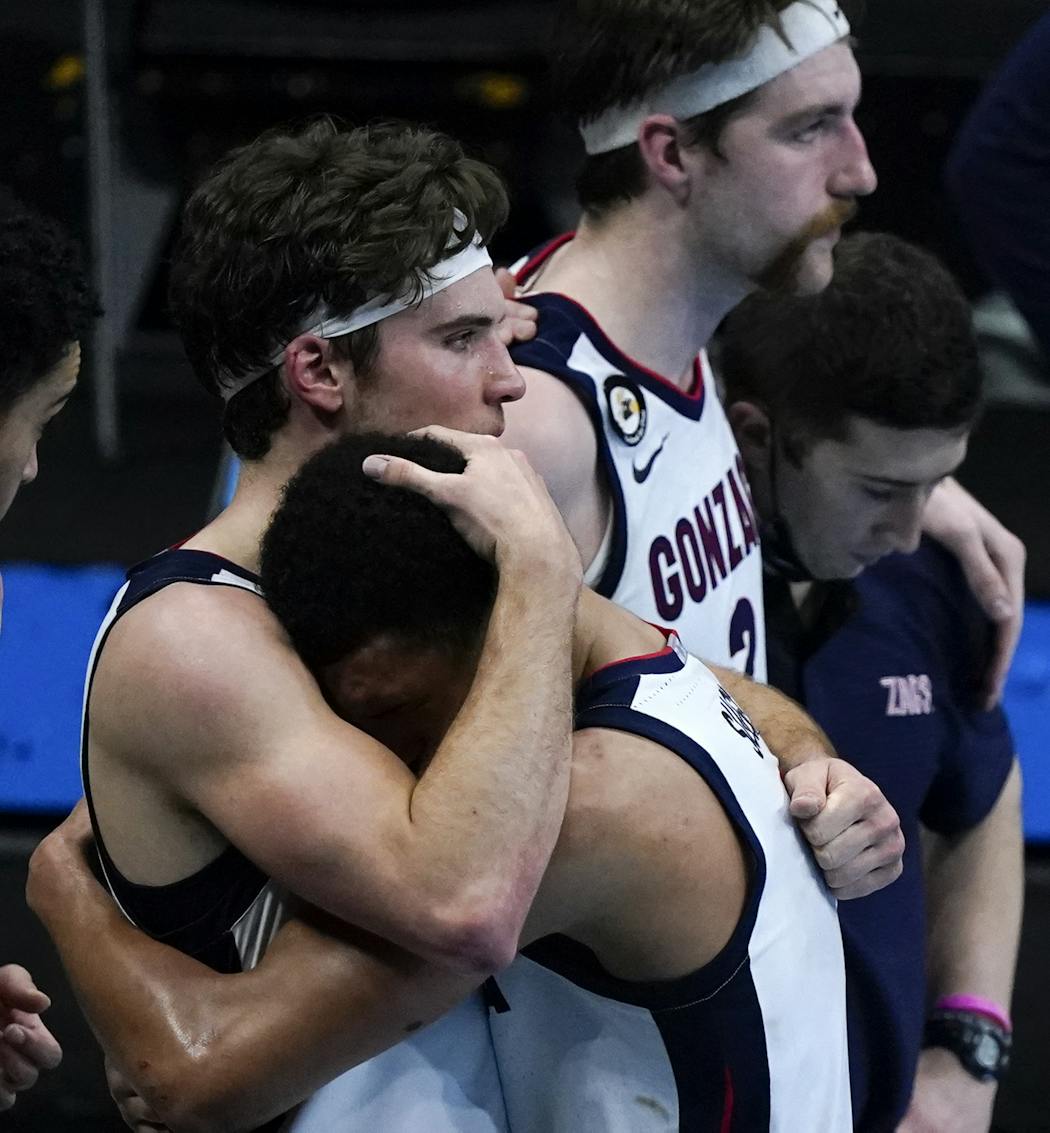 Gonzaga guard Jalen Suggs got a hug from Corey Kispert as the final minutes ticked down on the Zags’ season.