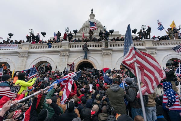 Pro-Trump supporters pushed back against police at the U.S. Capitol in Washington, D.C., on Jan. 6. 