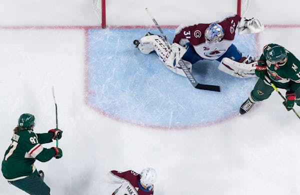 The Wild and Avalanche during a game last season.