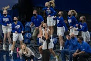 BBE’s Head Coach Kristina Anderson, center, and the bench reacted to a three-point shot during the second half of the game, Tuesday, April 6, 2021 i