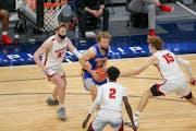 Wayzata�s Drew Berkland (15) finds himself surrounded by Shakopee defenders during the first half of the Class 4A semifinal Thursday night. Berkland