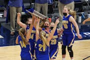 The Vikings celebrate winning the Class 1A title. Minneota held on to defeat Belgrade-Brooten-Elrosa 48-45 at Target Center on Friday afternoon. Photo