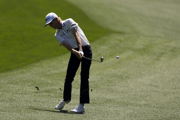 Will Zalatoris hits from the fairway on the 13th hole during a practice round for the Masters golf tournament on Monday, April 5, 2021, in Augusta, Ga