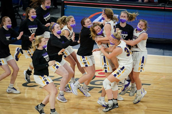 Chaska celebrated its 45-43 win against Rosemount for the 4A championship on Friday night.