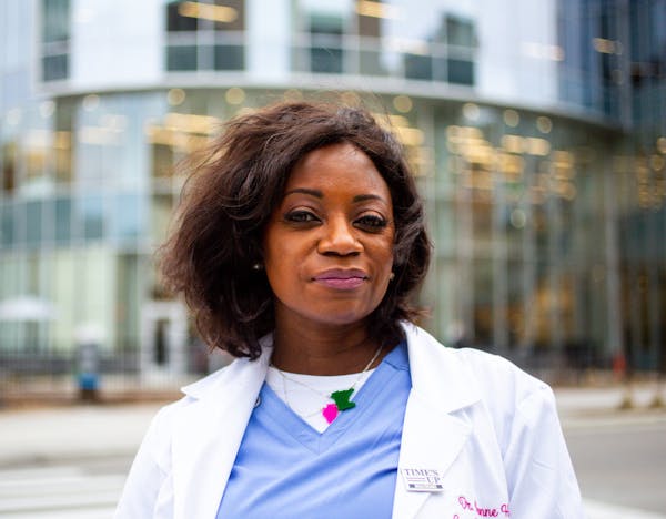 Dr. Dionne Hart poses for a portrait outside of Hennepin County Medical Center Saturday, April 10, 2021.