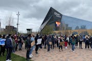 Students from Minneapolis schools gathered outside U.S. Bank Stadium on Monday afternoon as part of a statewide student walkout to protest against rac