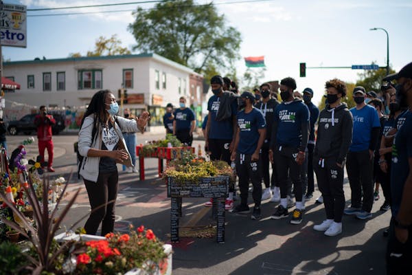 Timberwolves players visited the George Floyd memorial at 38th and Chicago in October.