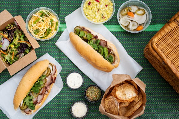 Vinai’s picnic kit includes bahn mi and a selection of sides.