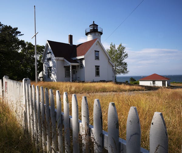 The West Chop Light and Coast Guard Station are shown, Sunday, June 28, 2020 in Tisbury, Mass. on the island of Martha’s Vineyard. The lighthouse wa