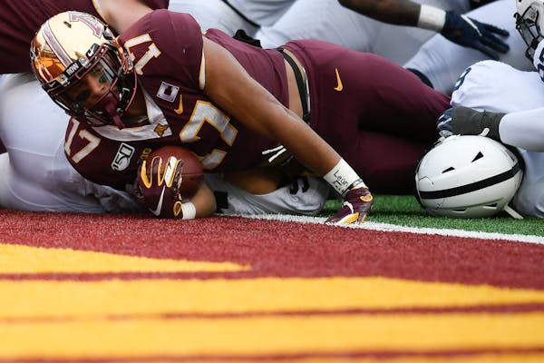 Seth Green scored one of his 15 career rushing touchdowns for the Gophers.