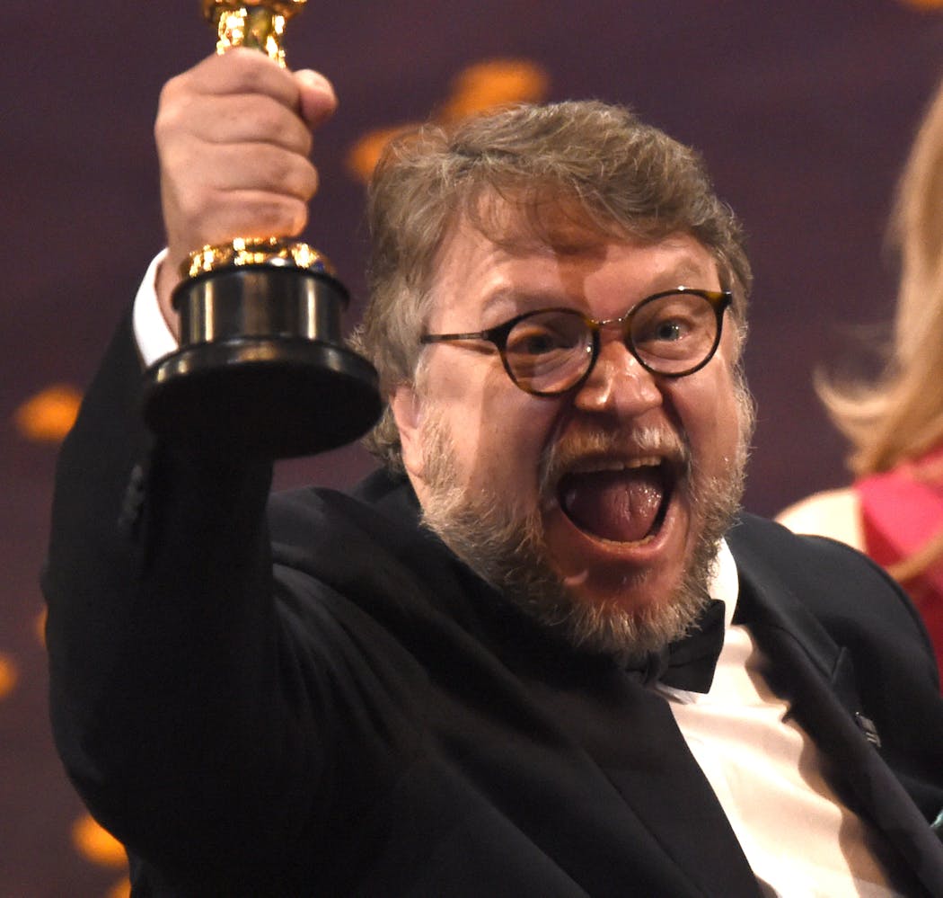 Guillermo del Toro celebrates his win for best director for 'The Shape of Water.'