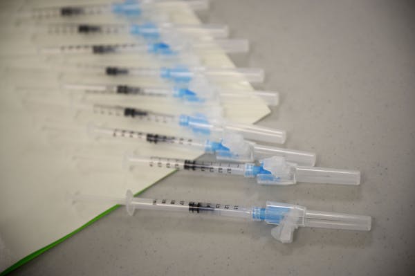 Syringes filled with the Moderna COVID-19 vaccine at a vaccination clinic in March. AARON LAVINSKY • aaron.lavinsky@startribune.com