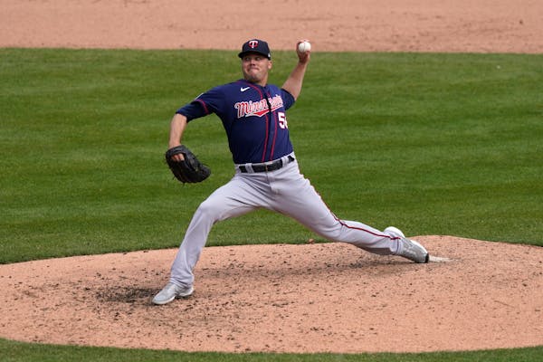 Minnesota Twins relief pitcher Caleb Thielbar throws during the eighth inning of a baseball game against the Detroit Tigers, Tuesday, April 6, 2021, i