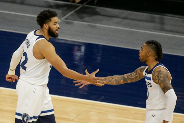 Since D’Angelo Russell (right) returned to the lineup under coach Chris Finch, the Wolves are 6-4 when both he and Karl-Anthony Towns play together 