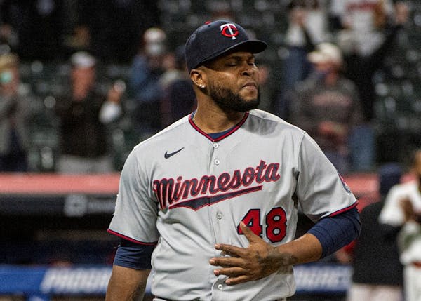 Minnesota Twins relief pitcher Alex Colome walks to the dugout after Monday’s loss.