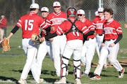 Teammates mob pitcher Stillwater pitcher Gavin Zurn following the Ponies’ 1-0 defeat of Mounds View Wednesday in a Suburban East Conference matchup.
