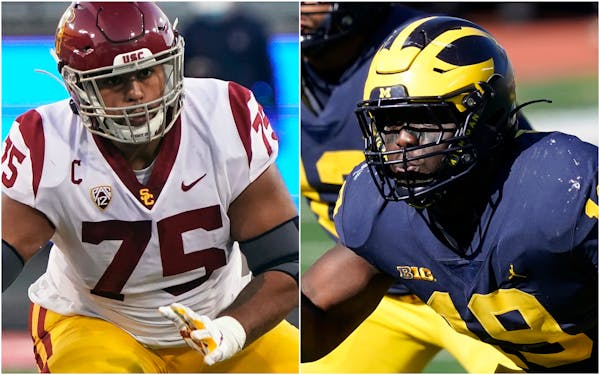 Offensive lineman Alijah Vera-Tucker of USC (left) and defensive lineman Kwity Paye of Michigan  are draft targets for the Vikings.