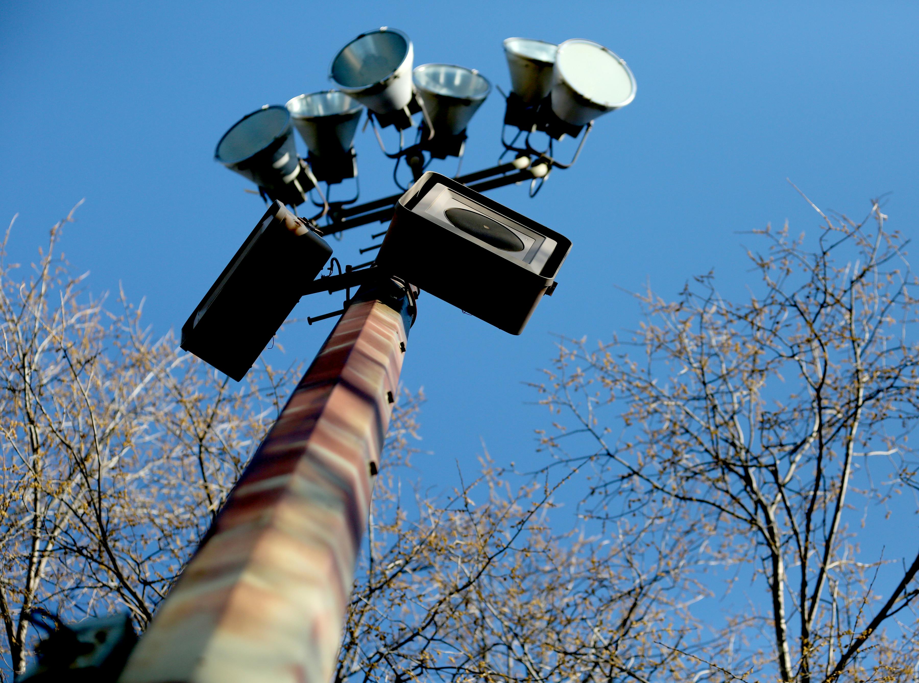 A siren installed on a light pole outside Phelps Community Center in Minneapolis.