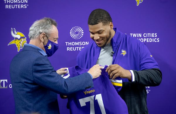Vikings owner Zygi Wilf with first-round draft pick Christian Darrisaw on Friday.