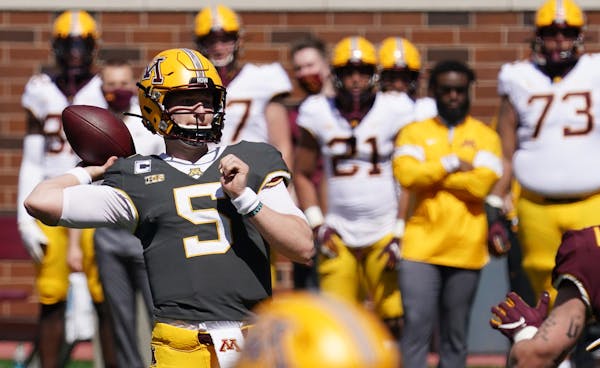 Quarterback Zack Annexstad (5) made a pass in the Gophers’ annual spring game on May 1.