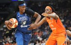 Lynx center Sylvia Fowles (left) is the WNBA defensive player of the year. Jonquel Jones of Connecticut was the unanimous choice as Player of the Year